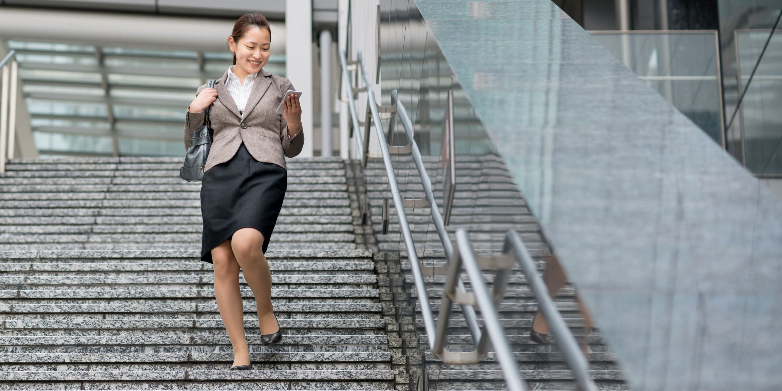 Happy lawyer leaving the office - lawyers have only been in their current role for less than two years